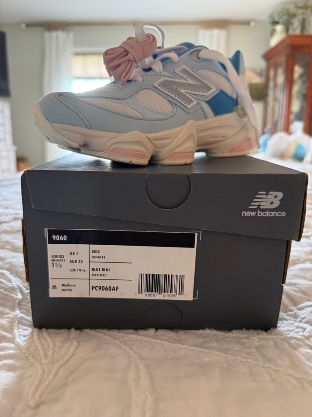 New Balance Kids Light Blue and Pink Sneaker